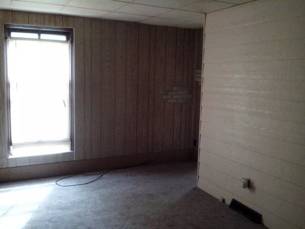 Living Room with new carpet and fresh paint-porch off living room