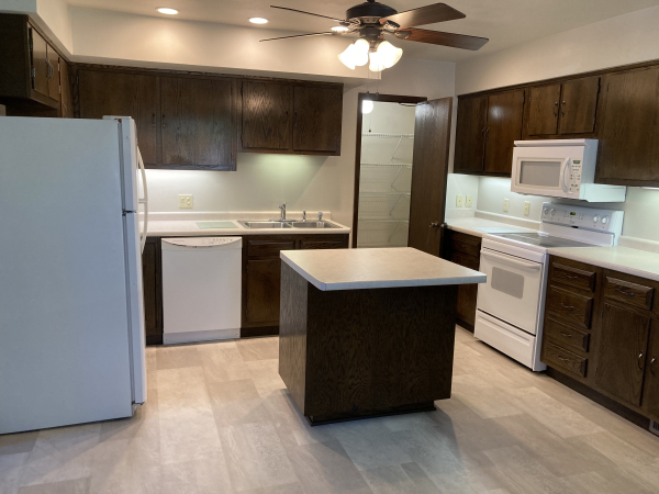 Kitchen toward Island & Pantry Room